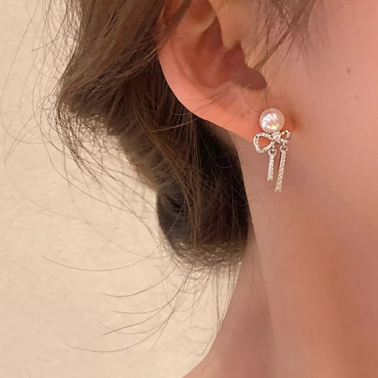 The Éloïse Pearl-Bow Earrings — featured square view